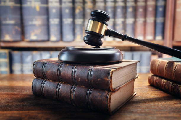 Gavel on law books - legal representation in Kuwait